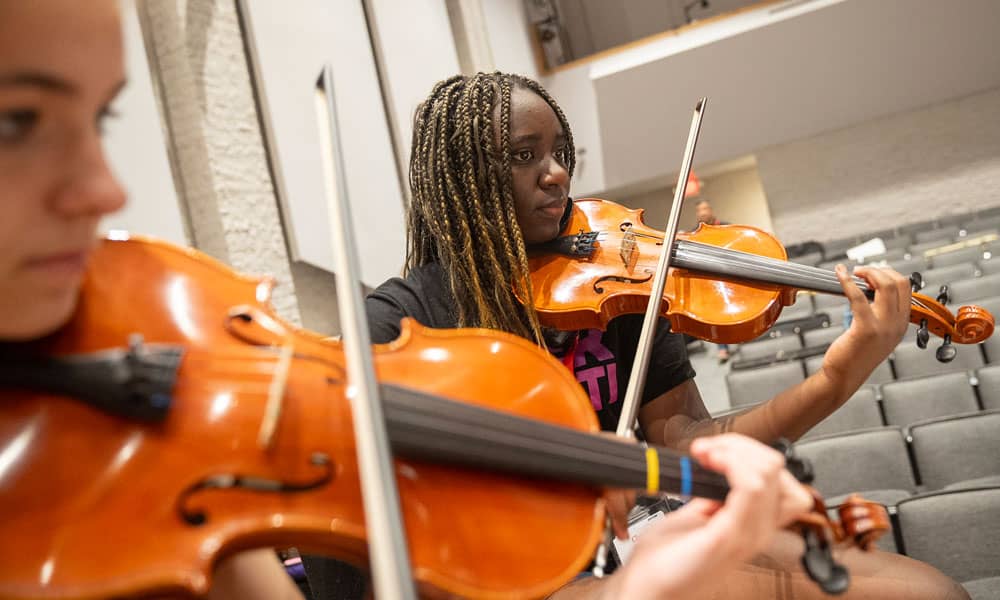 Students playing instruments